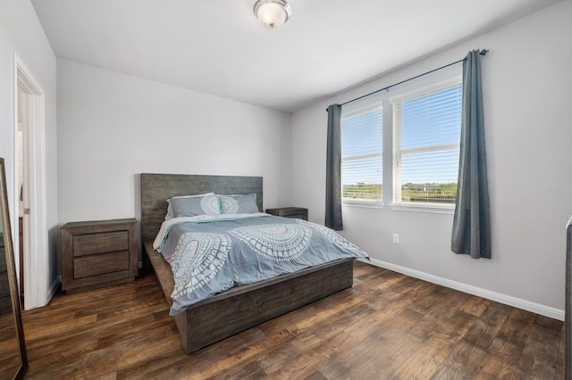 bedroom featuring dark wood-type flooring