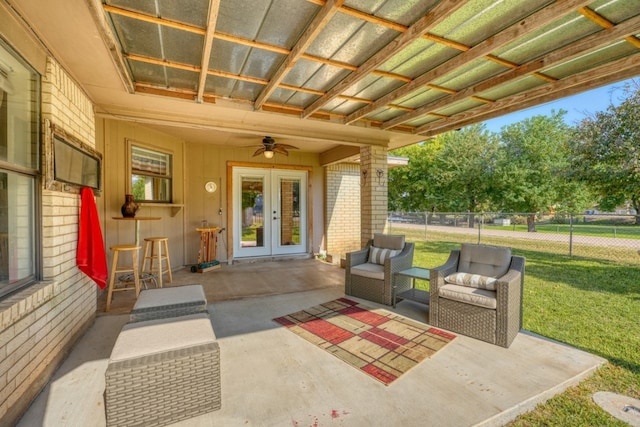 view of patio / terrace featuring ceiling fan