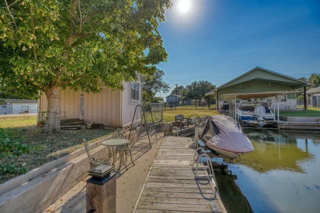 dock area featuring a water view