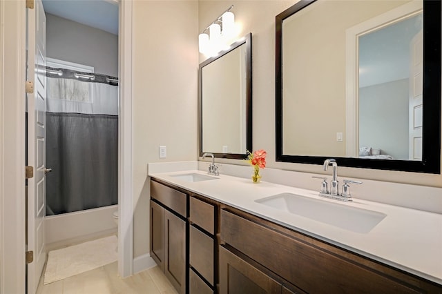 full bathroom with vanity, shower / tub combo, toilet, and tile patterned flooring