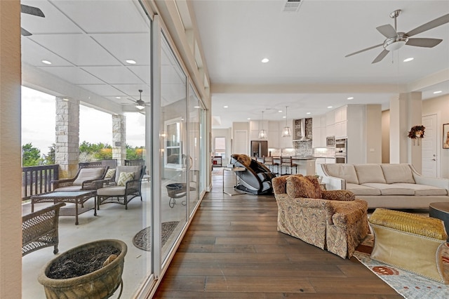 living room with dark hardwood / wood-style floors