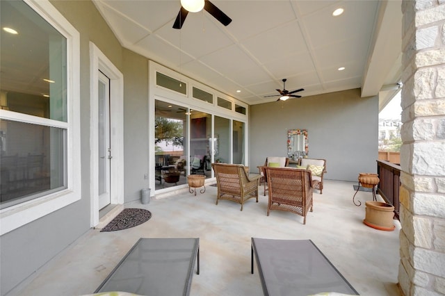 view of patio featuring outdoor lounge area and ceiling fan