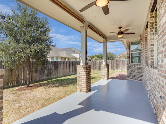 view of patio featuring ceiling fan