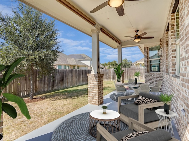 view of patio / terrace featuring ceiling fan