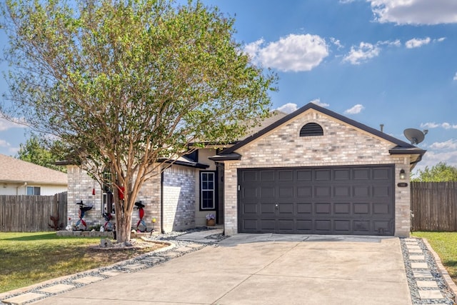 ranch-style home featuring a garage and a front lawn