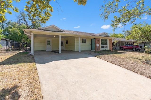 view of front of house with a carport