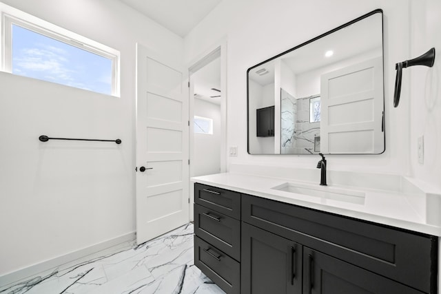 bathroom with vanity and walk in shower