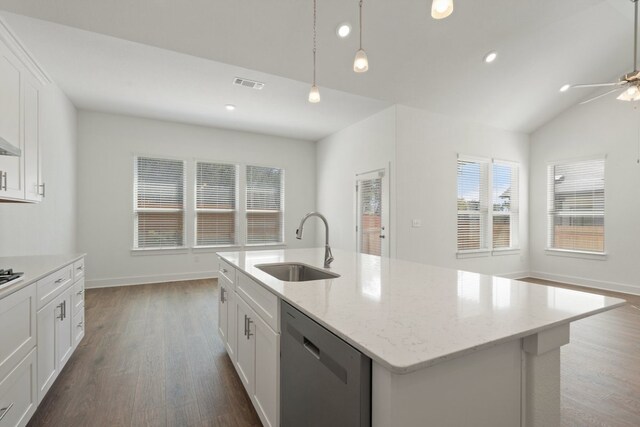 kitchen featuring an island with sink, hardwood / wood-style flooring, stainless steel dishwasher, pendant lighting, and sink