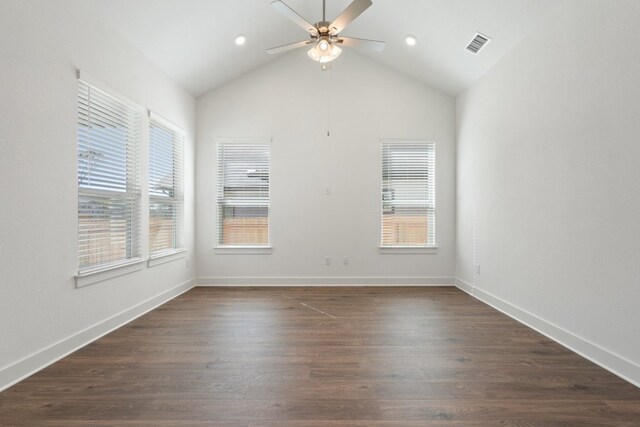 spare room featuring lofted ceiling, ceiling fan, and dark hardwood / wood-style flooring