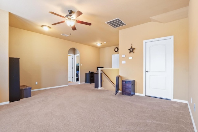 carpeted empty room with ceiling fan