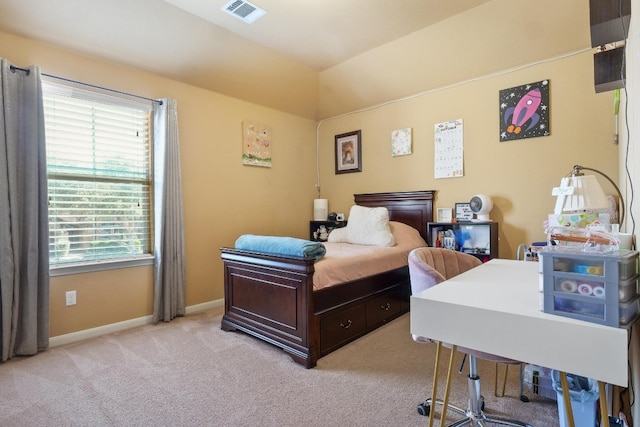 bedroom with light carpet and lofted ceiling