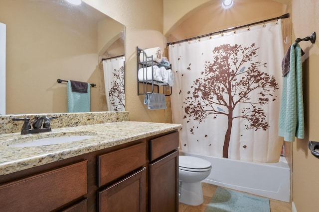 full bathroom with vanity, tile patterned floors, toilet, and shower / tub combo with curtain