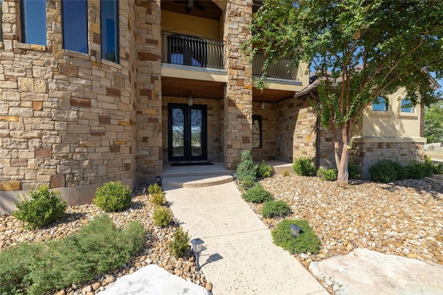 doorway to property featuring a balcony