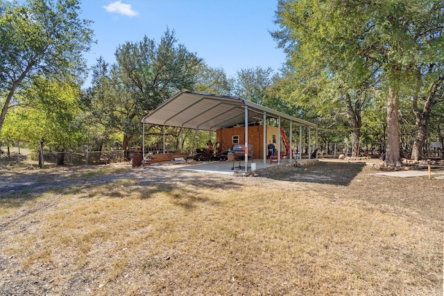 view of yard featuring a carport