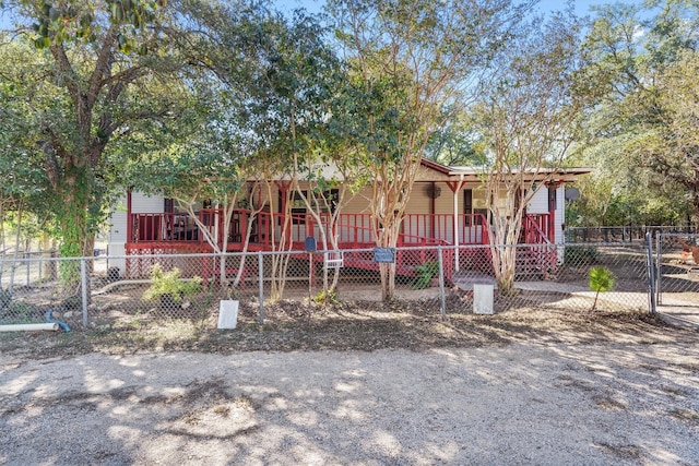 view of front of home featuring a wooden deck