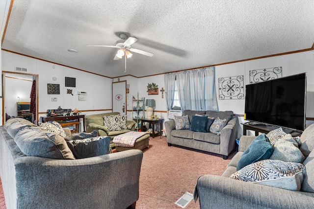 living room featuring ceiling fan, light colored carpet, a textured ceiling, and ornamental molding