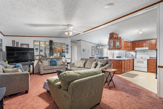 living room with ceiling fan with notable chandelier, light colored carpet, a textured ceiling, and lofted ceiling