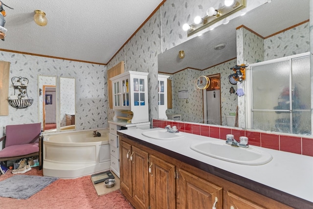 bathroom featuring vanity, ornamental molding, a textured ceiling, shower with separate bathtub, and vaulted ceiling