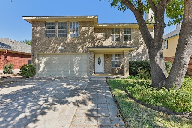 view of front of property with a garage