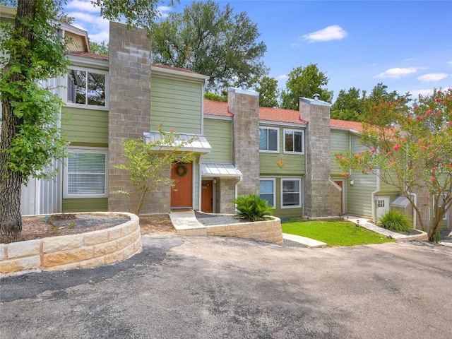 3601 Menchaca Rd Unit 109, Austin, TX 78704 - multi unit property with a chimney and stone siding