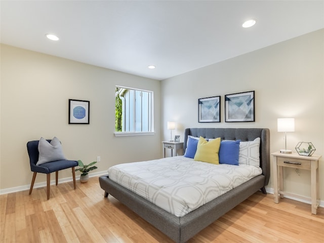 bedroom featuring light hardwood / wood-style floors