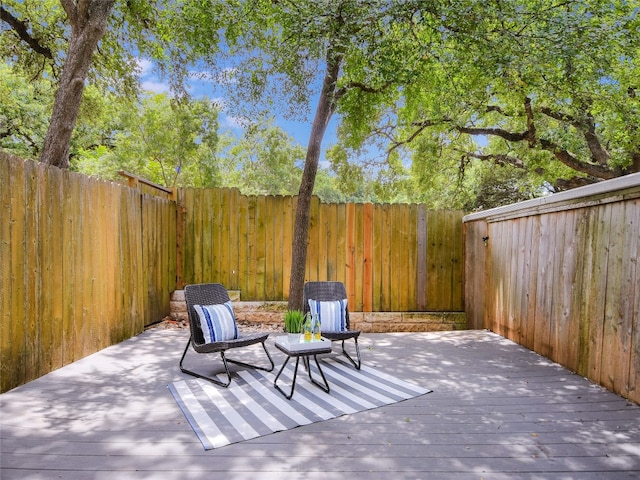 view of patio / terrace featuring a wooden deck