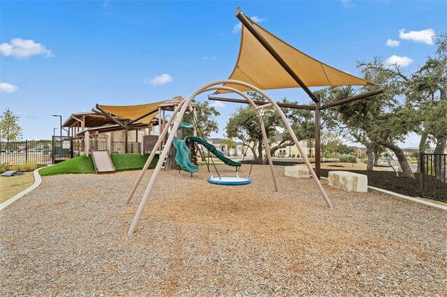 community play area featuring fence