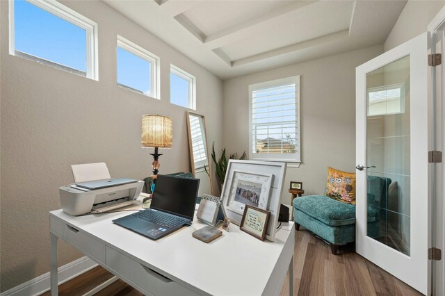 home office featuring french doors, wood finished floors, and baseboards