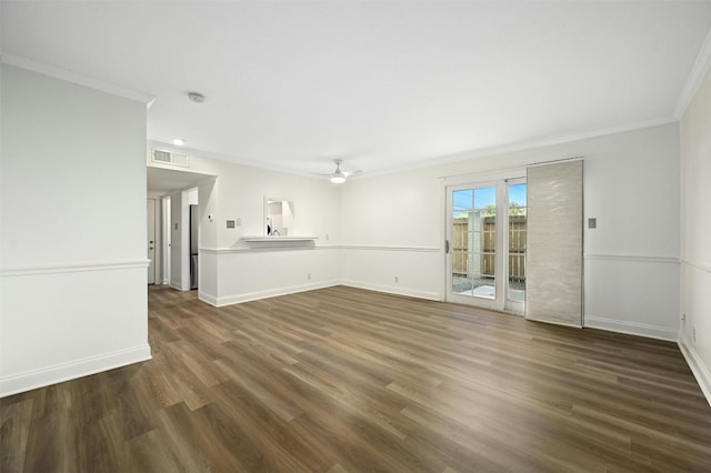 unfurnished room with ceiling fan, ornamental molding, and dark wood-type flooring