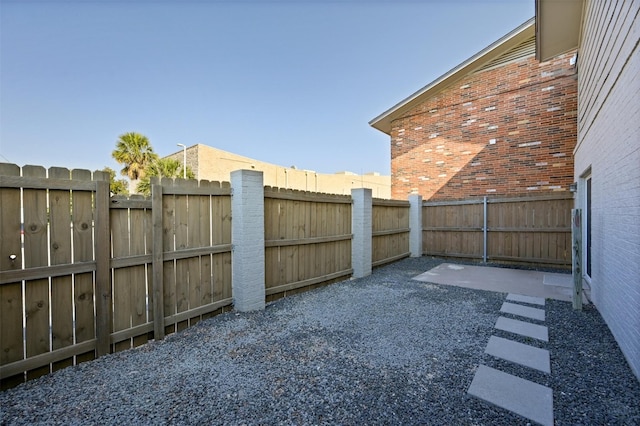 view of yard with a patio area