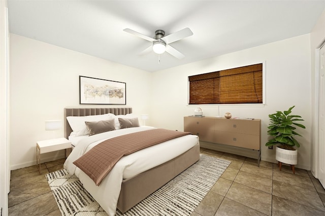 bedroom with light tile patterned flooring and ceiling fan