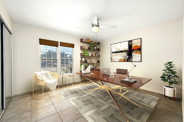 home office with ceiling fan and light tile patterned floors