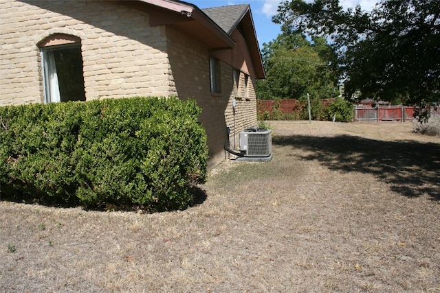 view of property exterior with central AC unit