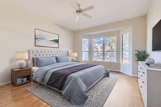 bedroom featuring ceiling fan and light wood-type flooring