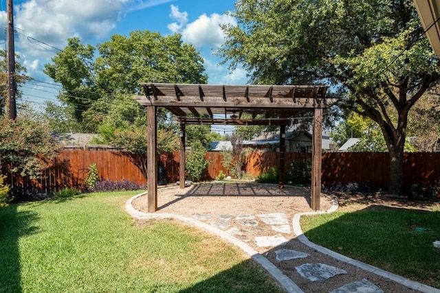 view of yard featuring a fenced backyard and a pergola