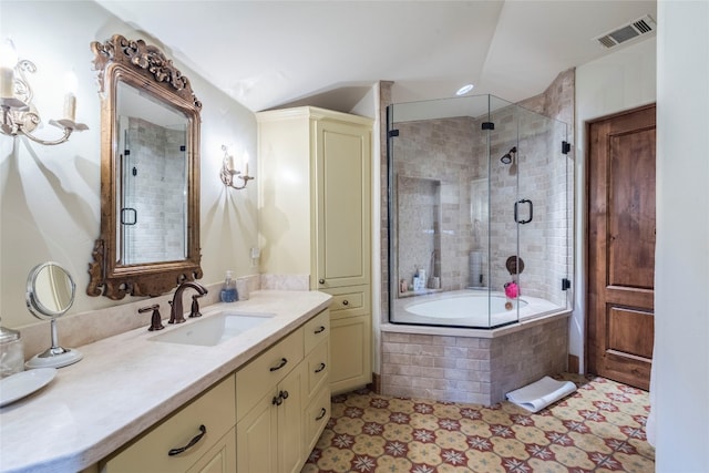 bathroom featuring separate shower and tub and vanity