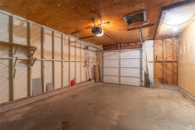 garage featuring a garage door opener