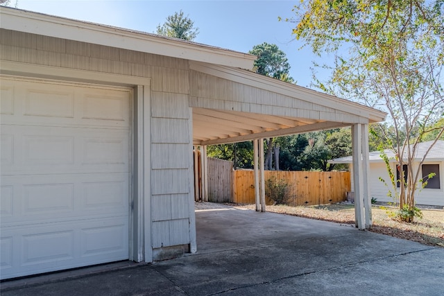 garage featuring wood walls