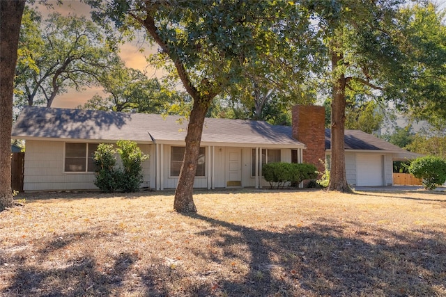 single story home featuring a garage