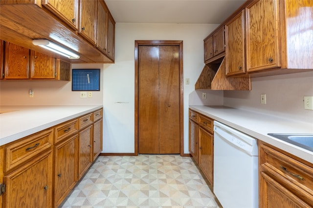 kitchen featuring white dishwasher