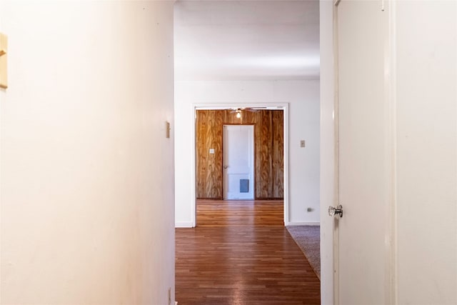 hallway featuring dark wood-type flooring