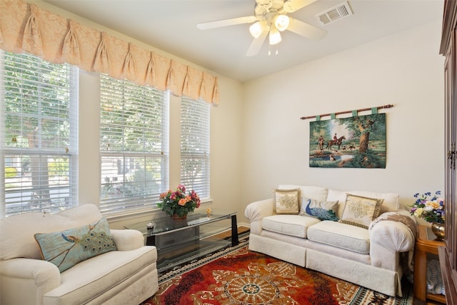 living room featuring ceiling fan