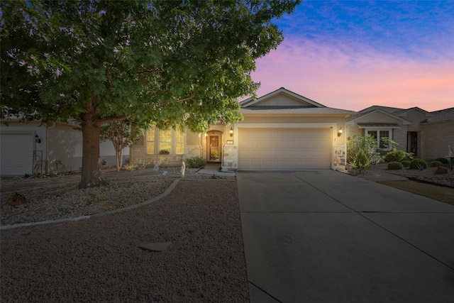 view of front of home with a garage