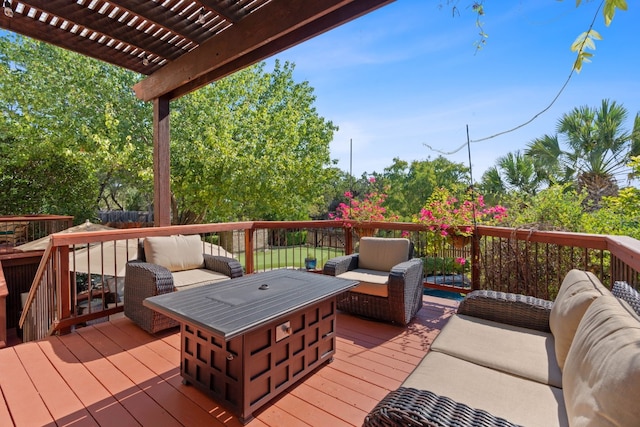 wooden terrace featuring an outdoor hangout area and a pergola