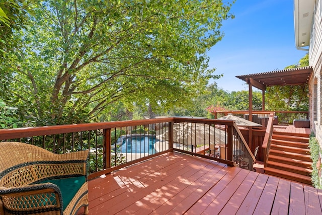 wooden deck featuring a pergola