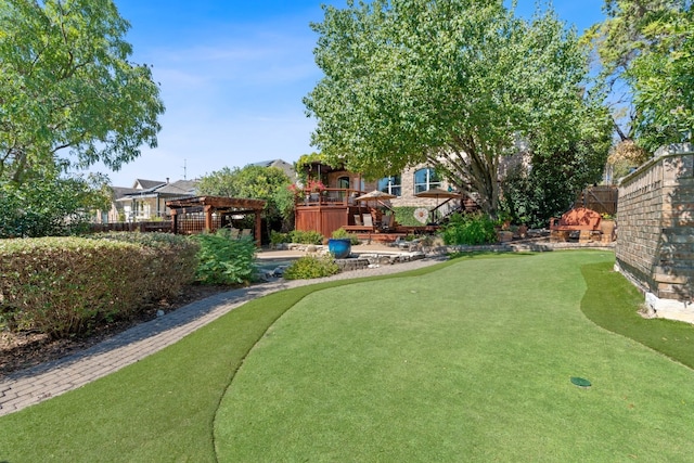 view of yard featuring a wooden deck