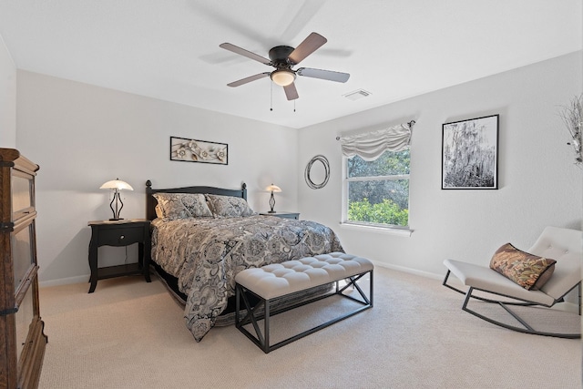 bedroom featuring ceiling fan and light colored carpet