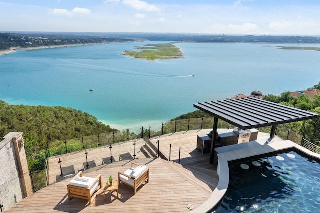 dock area featuring an outdoor hangout area and a water view