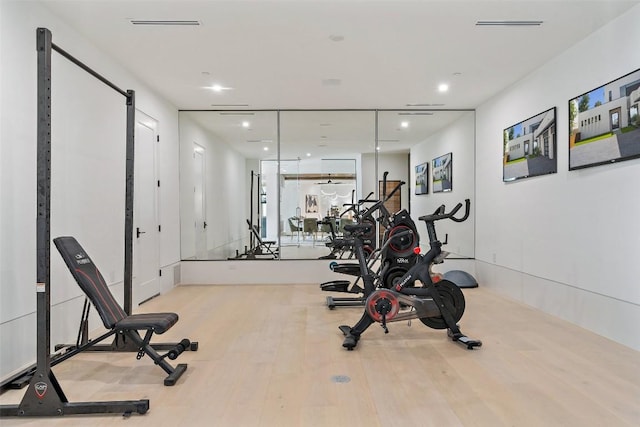 6809 Oasis Pass, Austin, TX 78732 - exercise room featuring wood finished floors and recessed lighting