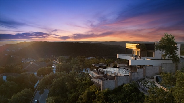 aerial view at dusk with a mountain view